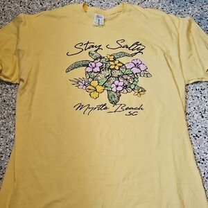 Delta Yellow Graphic Tee with Floral Turtle Design. Stay Salty Myrtle Beach SC.